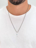 Men's Hand Pendant with a Small Turquoise Gemstone in Silver